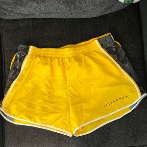 Live strong yellow Nike running shorts